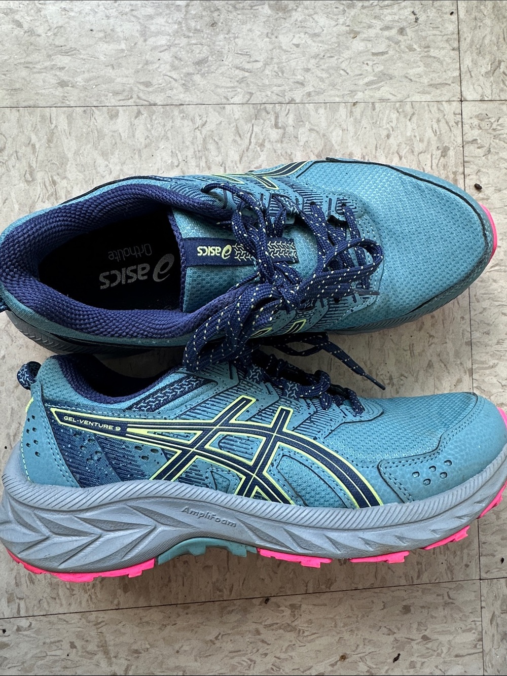 Asics Navy Running Shoes with Teal Trim and Yellow Logo